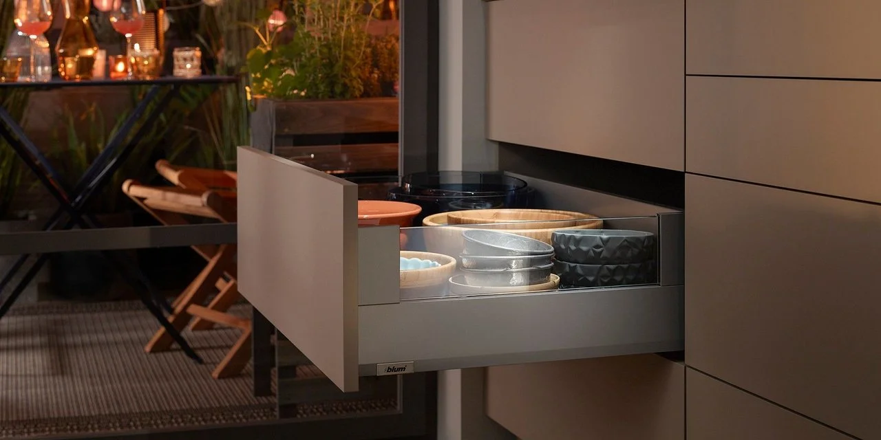 Kitchen cabinet with open drawer and Blum furniture fitting 